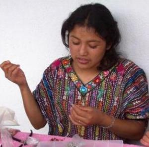 Jewelry artisan creates products for sales generated through Mercado Global.